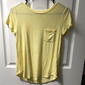 pale yellow soft tee with front pocket